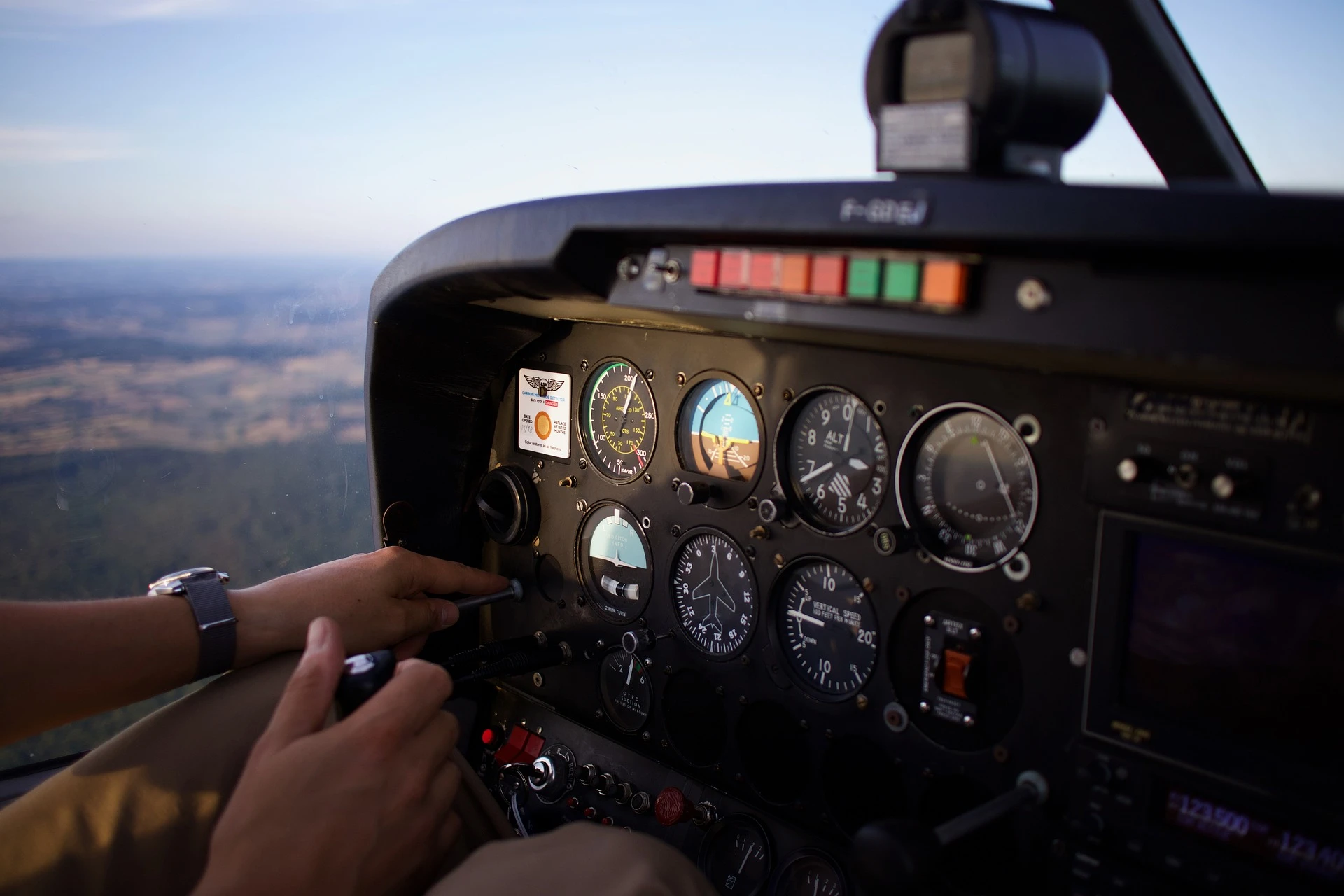 Photo of a pilot flying a plane